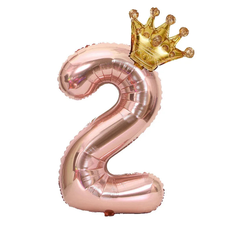 Rose gold foil balloon shaped like the number 2 with a gold crown on top