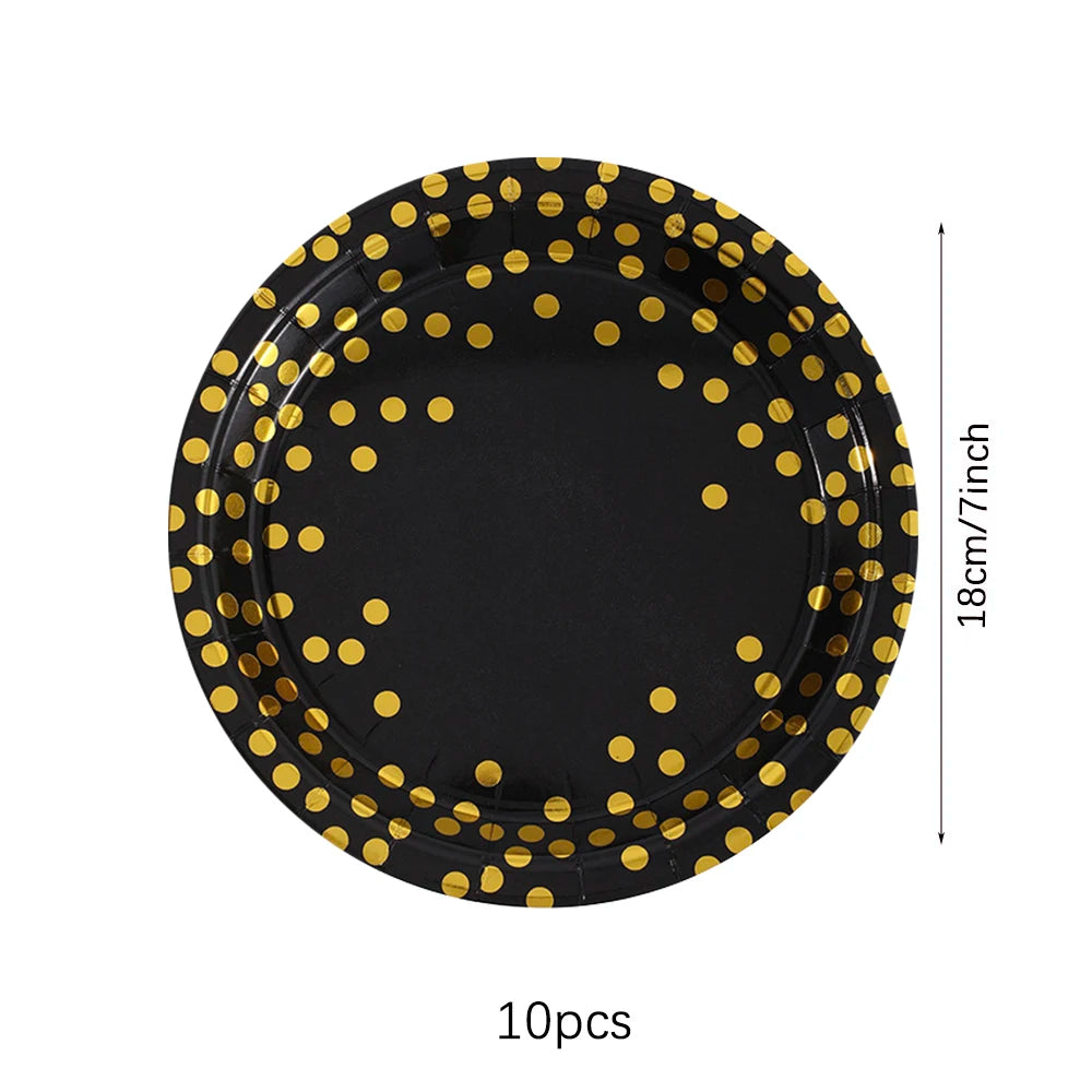 A black disposable dinner plate rimmed with gold dots, shown with a 18cm diameter.