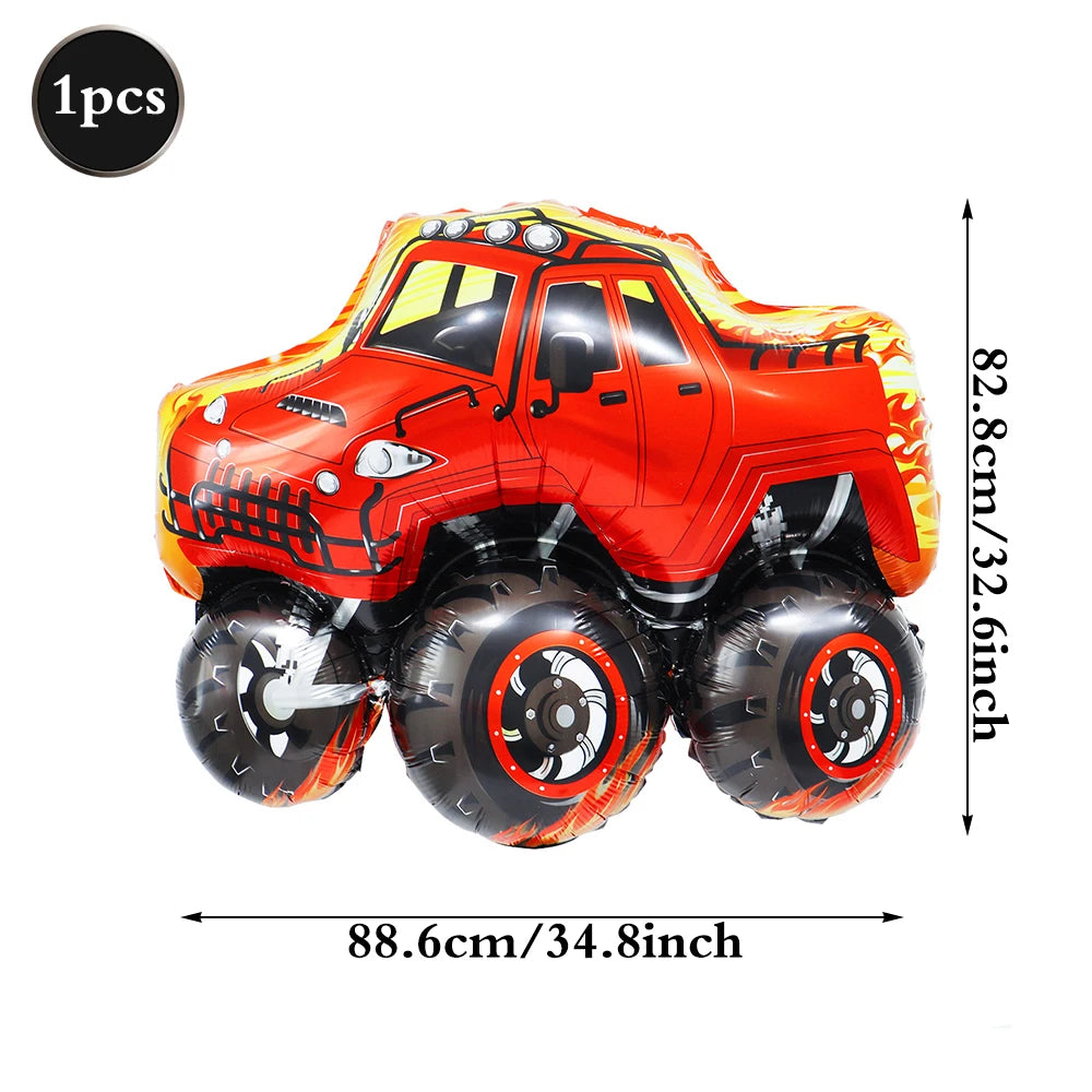 A bright orange race car traffic light balloon set with black tires and yellow accents.