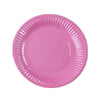 A pink disposable plate with ruffled edges.