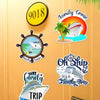 A set of four magnetic cruise door decorations including a yellow circle with 9018, a tropical scene, and ship designs.