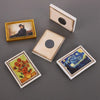 A collection of four framed art magnets featuring paintings, including a portrait and a swirling night sky.