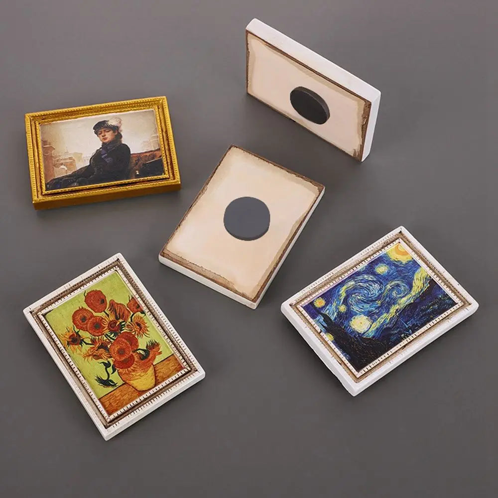 A collection of four framed art magnets featuring paintings, including a portrait and a swirling night sky.