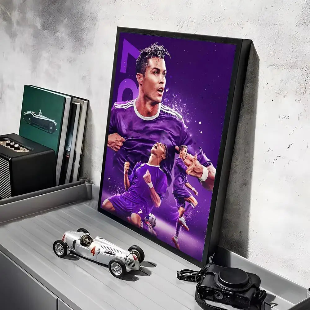 A framed canvas art poster featuring a dynamic image of Ronaldo in purple football attire against a vibrant purple background