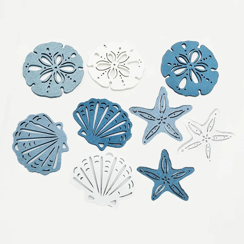A set of twelve wooden ocean ornaments featuring various sea life shapes like shells, scallops, and starfish in blue and whit