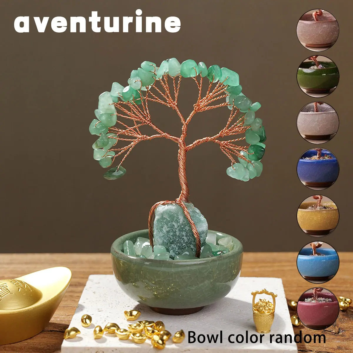 A natural crystal money tree with rose quartz base featuring green crystal leaves in a bowl.