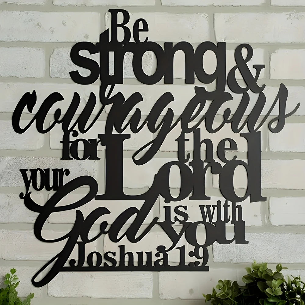 Black metal wall art featuring the text Be strong and courageous for the Lord is with you from Joshua 1:9
