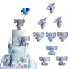 A tiered cake topper featuring fondant elephants in various sizes and colors