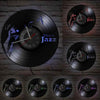 A collection of vintage vinyl records featuring the text This is Jazz displayed against a brick wall background.
