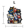 A wooden jigsaw puzzle featuring various cat-shaped figures, including black, blue, orange, and white cats.