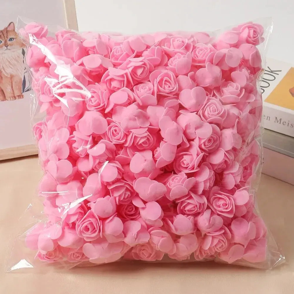 A bag of pink PE foam artificial rose flowers for DIY decor