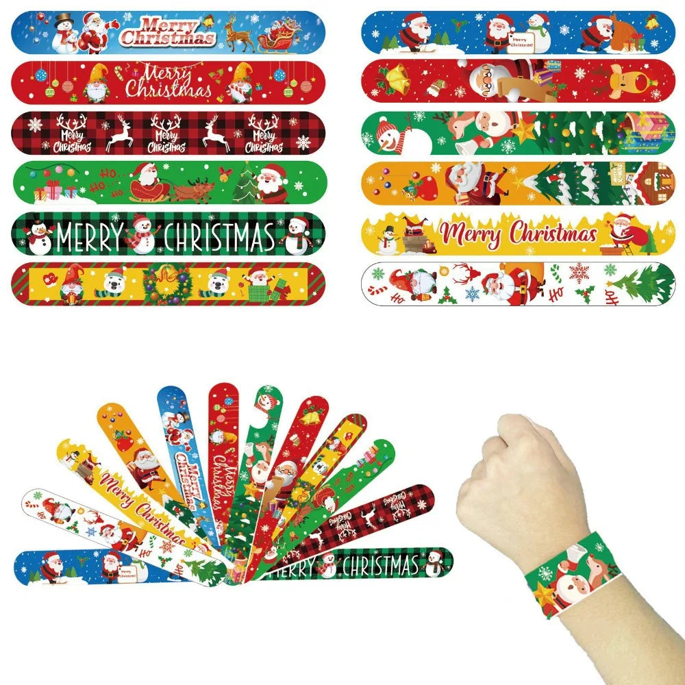 A hand holds a collection of colorful Christmas cartoon slap bracelets for kids.