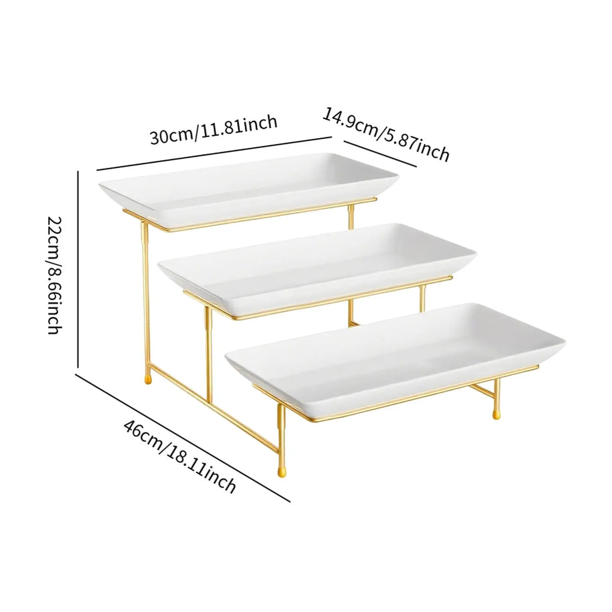 A three-tier rectangular serving platter stand with white ceramic plates and gold-colored metal legs.