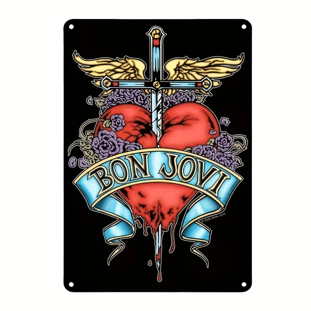 Vintage metal wall art sign featuring a stylized cross with wings and a heart design in red and purple tones.