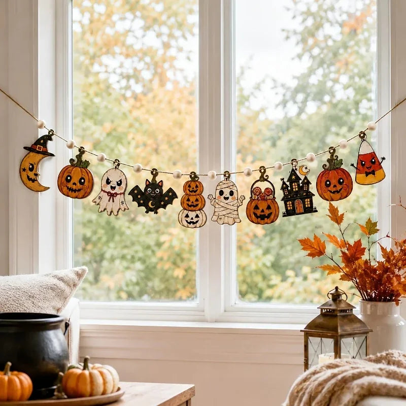 A vintage wooden hanging garland featuring retro Halloween decorations like pumpkins, ghosts, and cats displayed in a window 