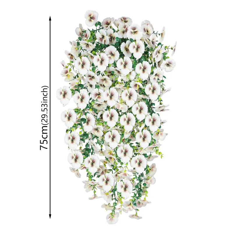 A vertical arrangement of artificial eucalyptus and violet pansy hanging vine flowers.