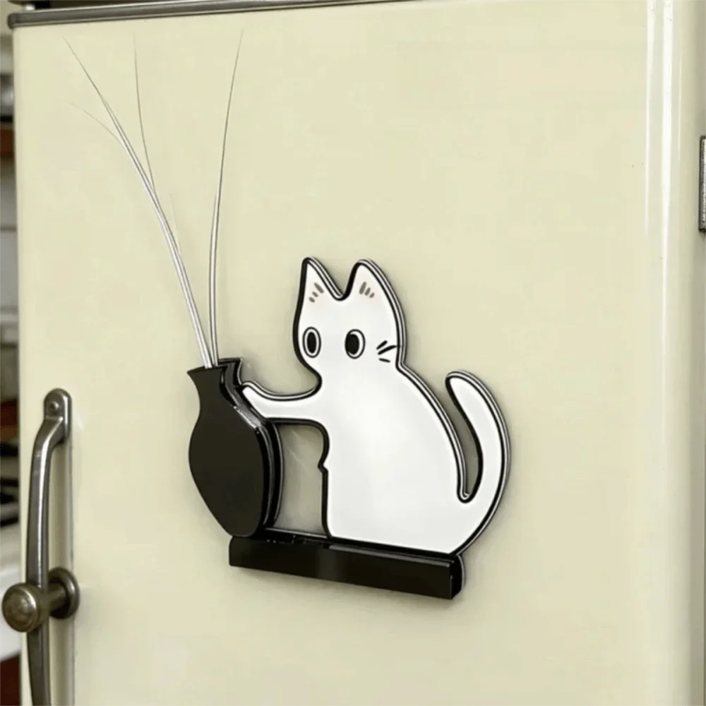 A silver magnetic acrylic cat whiskered decor mounted on a light-colored door.