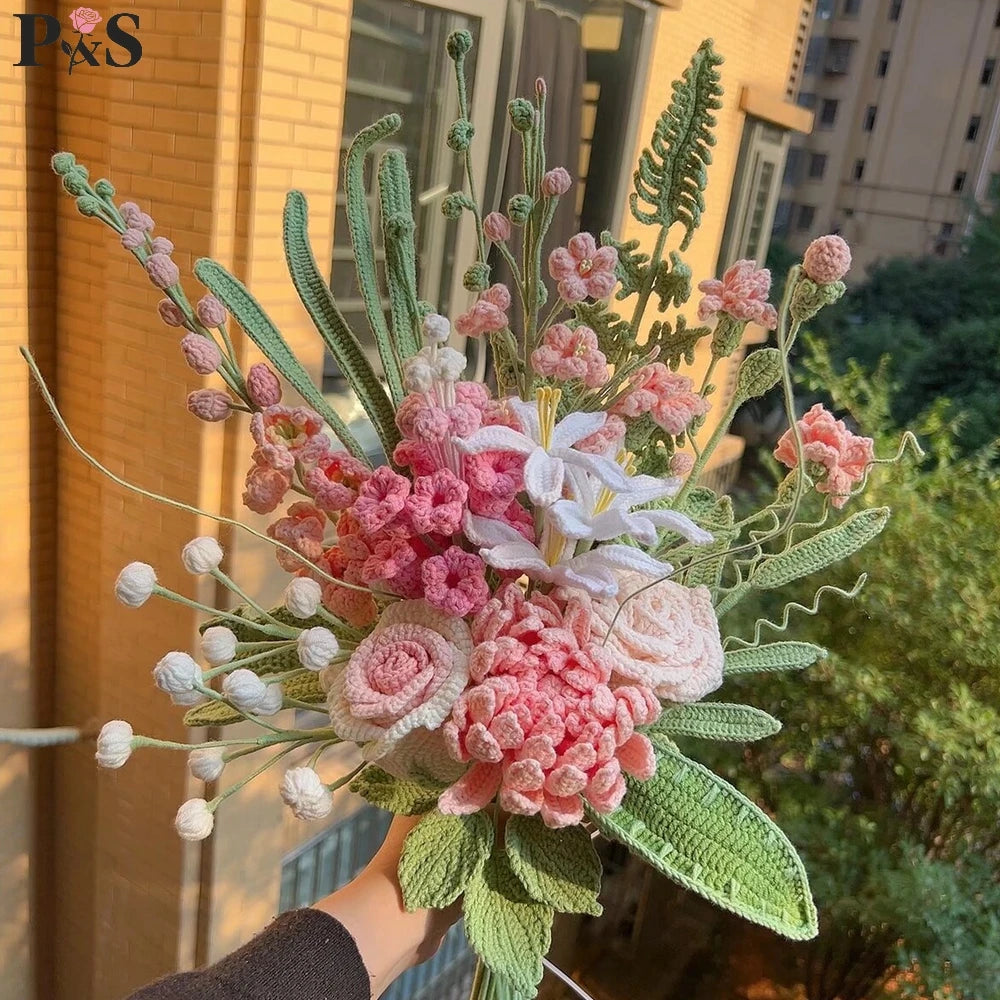 A handmade crochet flower bouquet featuring pink peonies, white tulips, and roses with green foliage.