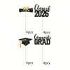 A set of black and gold glitter graduation cake toppers featuring 'Class of 2026' and 'Congrats Grad' text.
