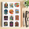 A spiral-bound notebook filled with retro ghost decorative stickers featuring science and family themes.