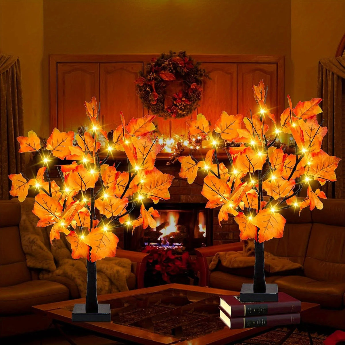 Warm glow maple tree tabletop decoration with lights displayed on a wooden table.