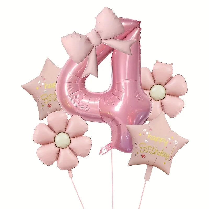 Pink foil number balloon shaped like the number 4 with a flower bow and a pink star balloon