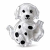 Clear capsule cat whisker keepsake magnet with a white and gray spotted design