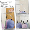 A versatile closet accessory showing a round hook used to hang various hats, scarves, and bags.