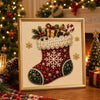 A framed diamond painting depicting a red and green Christmas stocking with white pearls and snowflakes.