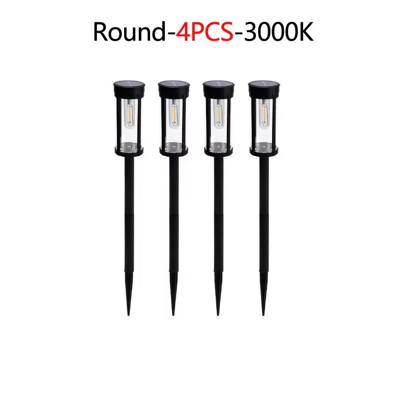 Four round solar pathway lights with 3000K illumination.