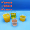 A collection of disposable mini tasting cups filled with various colored liquids, including yellow, green, and pink.
