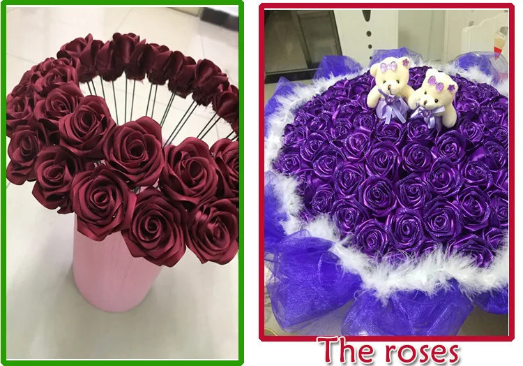 A bouquet of deep burgundy roses with small teddy bears in a purple wrapping