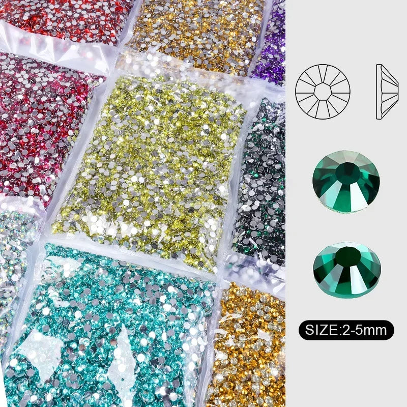 A collection of round flatback resin rhinestones in various colors including gold, green, silver, and purple, shown with size