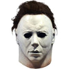 A white latex mask sculpted to resemble a pale, emotionless human face for horror or cosplay.