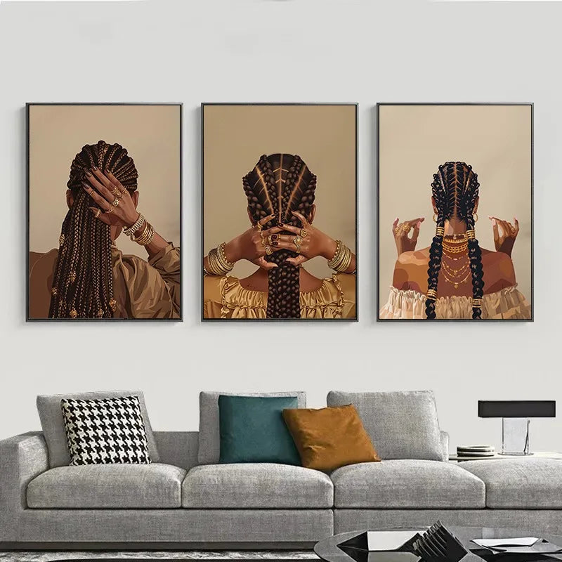 Three framed canvas art portraits of an African American woman with intricate braids and gold jewelry.