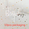 A clear acrylic sheet with 'Happy Birthday' written in silver script and scattered gold stars, indicating 10 pieces packaging