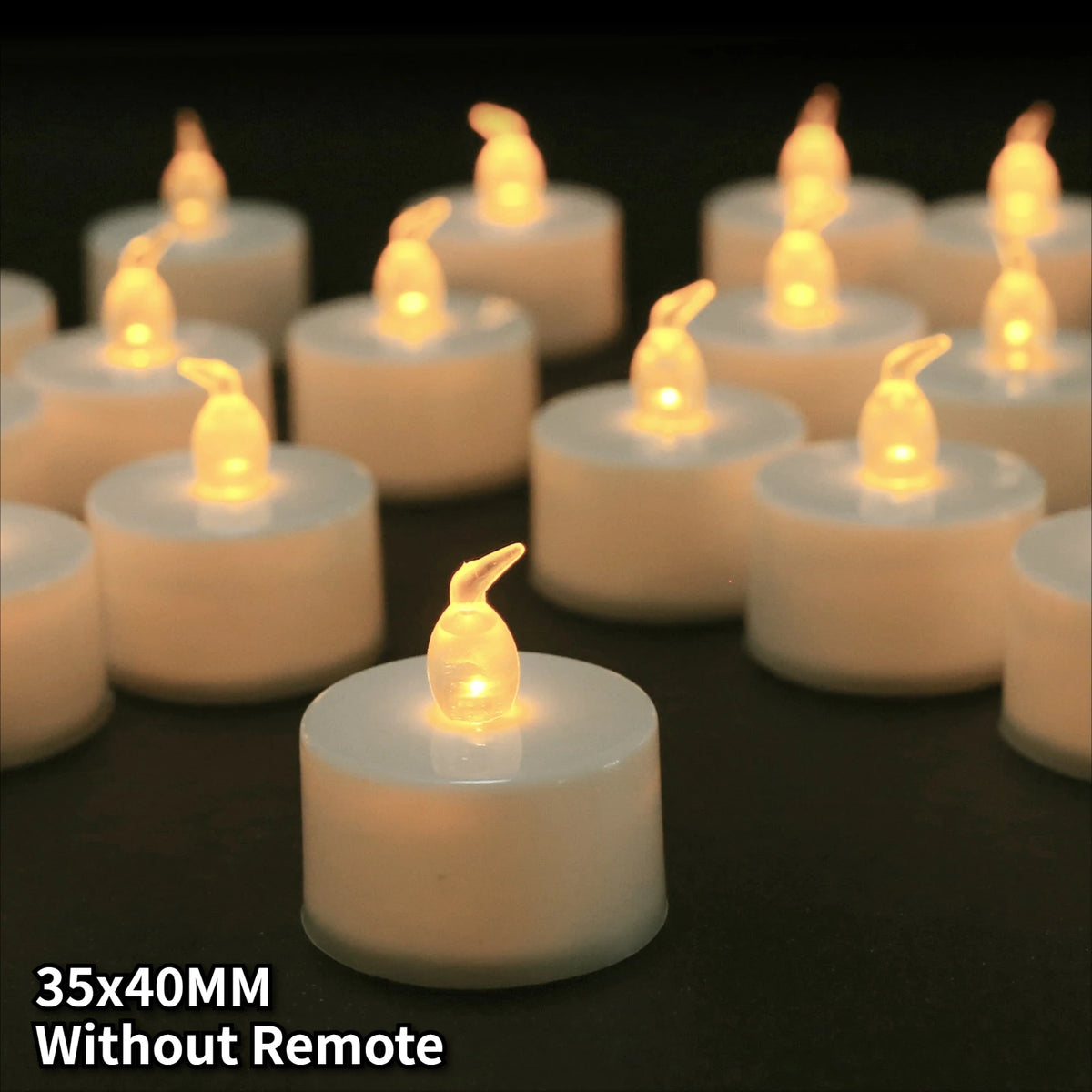 A row of white LED tea light candles with glowing yellow flames arranged on a dark surface.