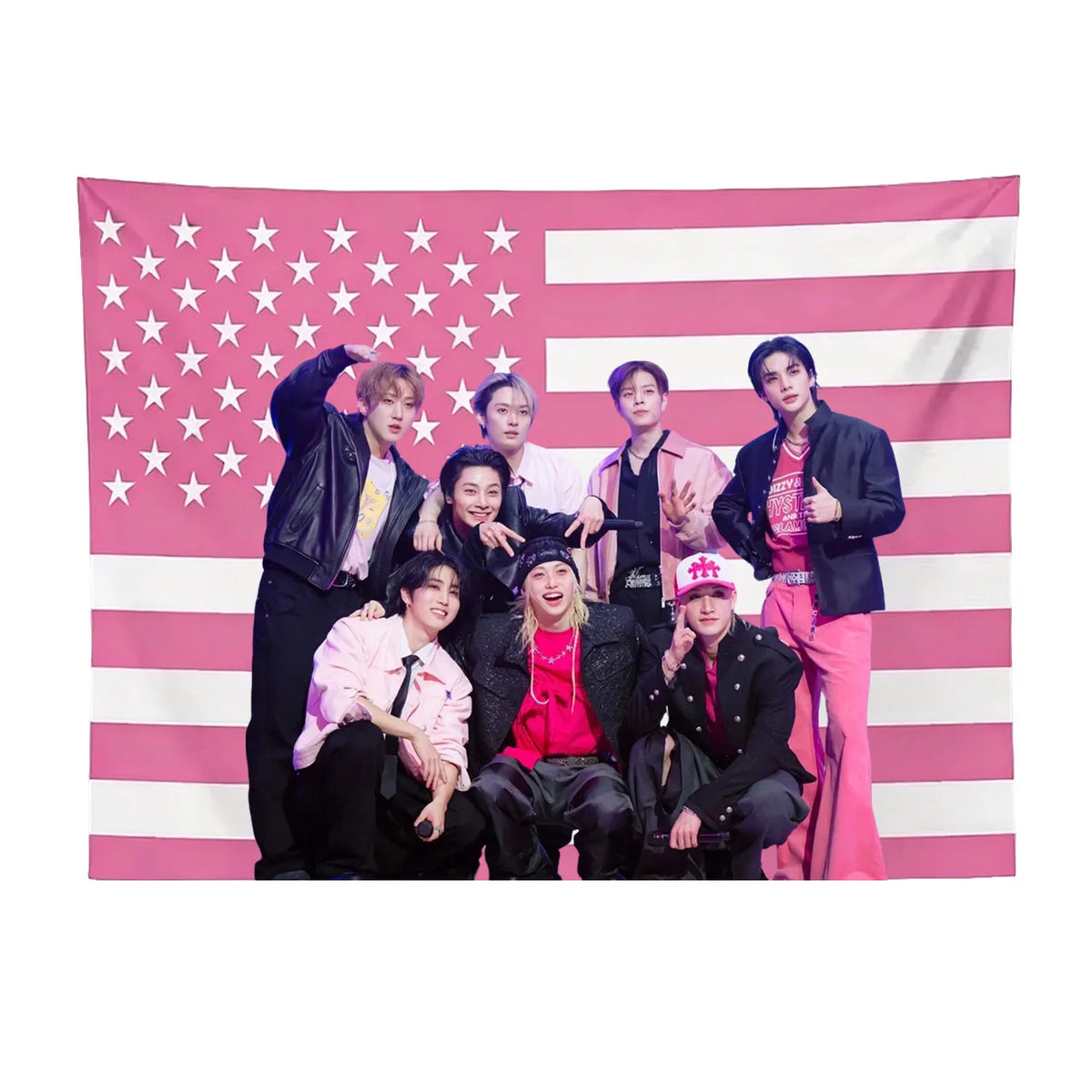 A pink American flag tapestry featuring seven Kpop idols standing against a striped background.