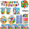 A set of colorful building block birthday party decorations including banners, balloons, and themed plates.