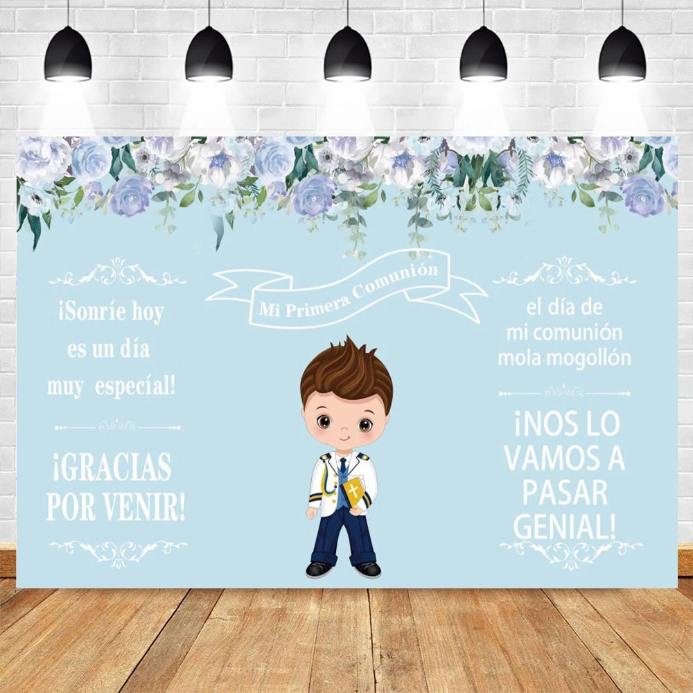 A light blue backdrop featuring floral greenery and text for a First Communion celebration with a young boy.