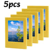 Five yellow magnetic photo frames or fridge magnets displayed in a row.