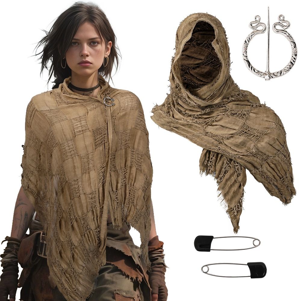 A female model wearing a textured, earth-toned hooded cloak with fringe and a Viking-style brooch.